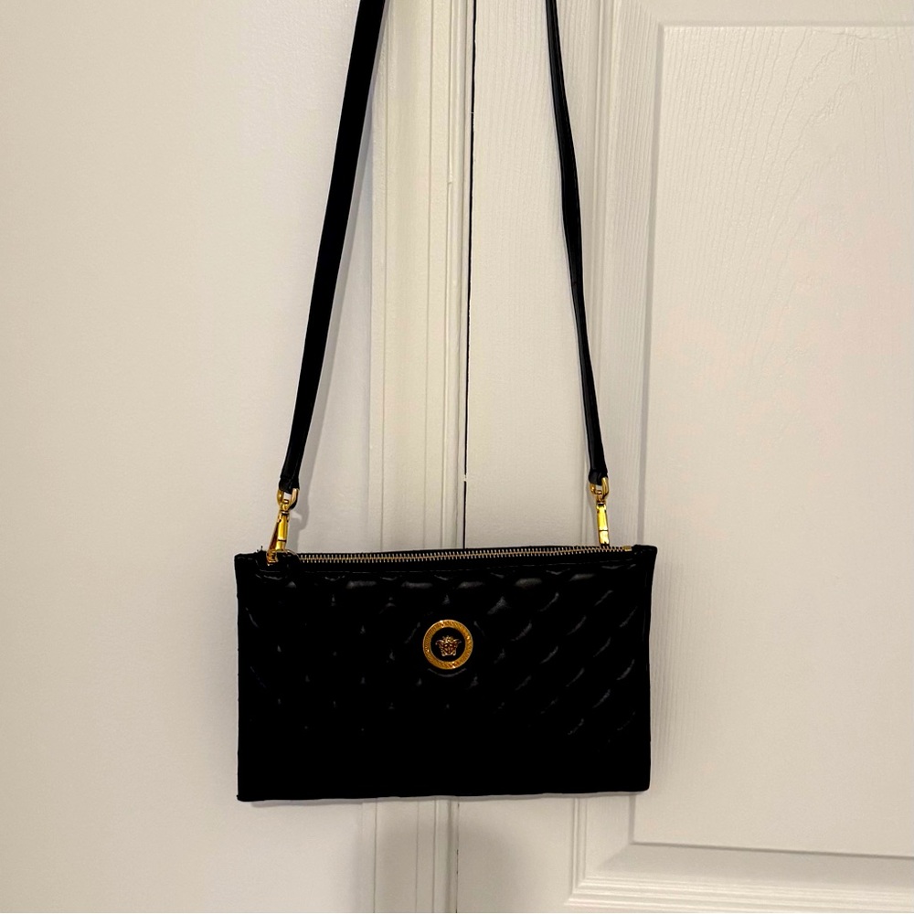 Pre owed Black Versace crossbody in excellent condition.